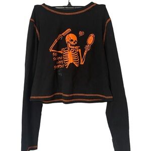 fall in love with yourself” skeleton long sleeve crop top. 🖤